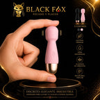 Mini varita wand rosa sostenida en la mano, tamaño real